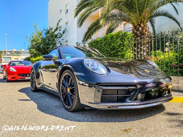 Porsche 911 Carrera 4S Cabrio and Ferrari California delivering in Cannes, France